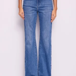 Vaqueros acampanados de algodón con pedrería